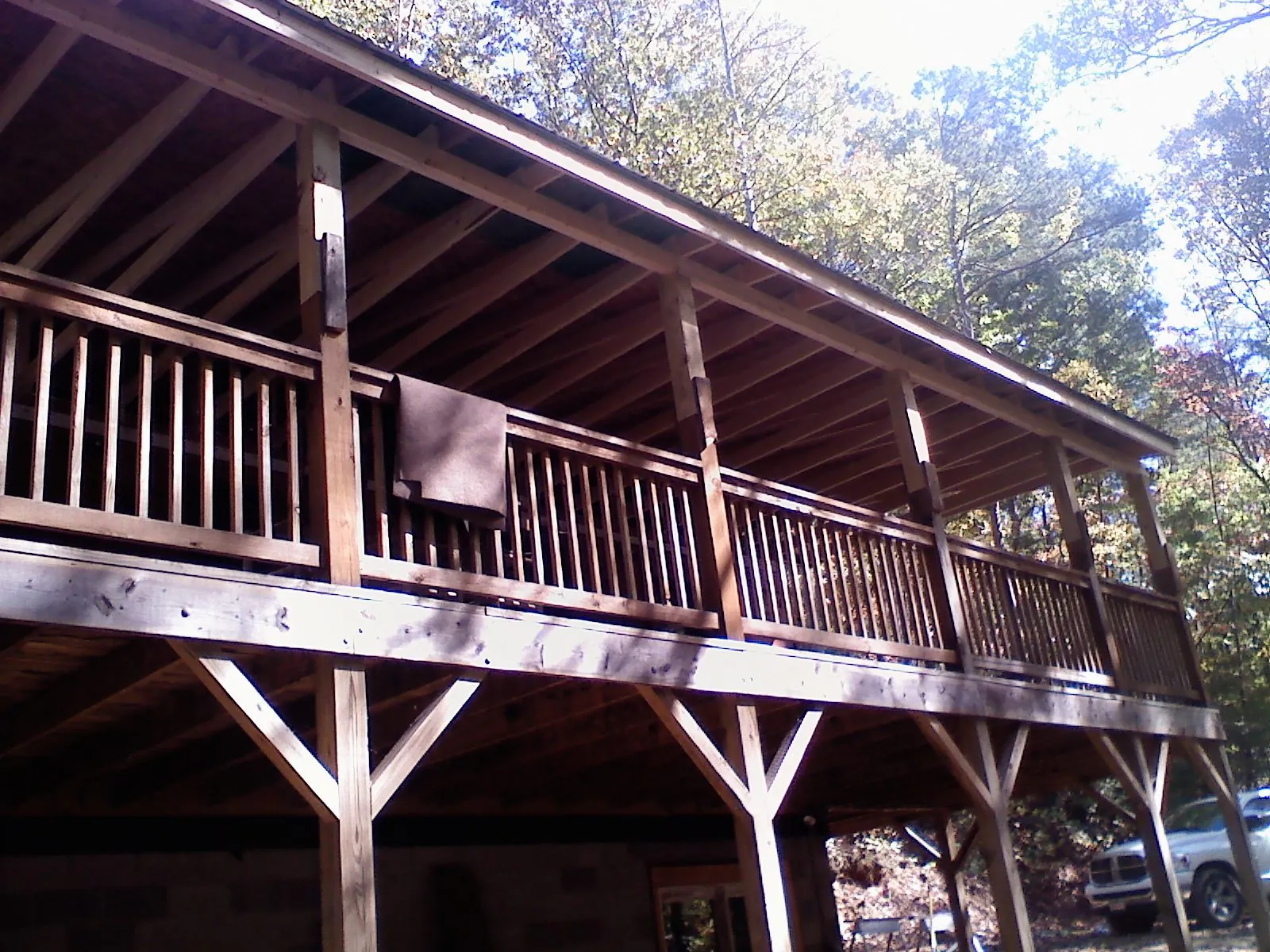 Timber framing under a new elevated porch and deck — Roof Leak Repair in Kingsville by Roofing Brothers